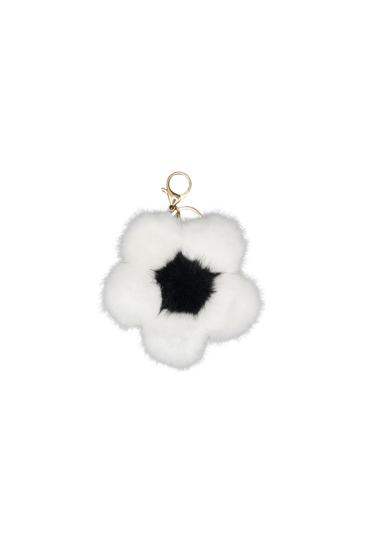 Single dalmatian white faux fur flower charm on a metal keychain, worn as a bag charm
